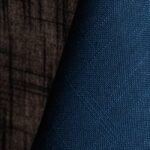 Navy blue textured dinner napkin.