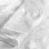 Sheer white embroidered overlay, tablecloth, and runner.