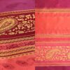 Red, orange, yellow, and pink printed tablecloth and runner.