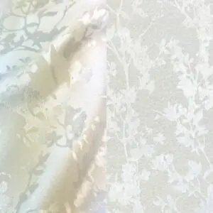 Elegant white floral tone-on-tone tablecloth.