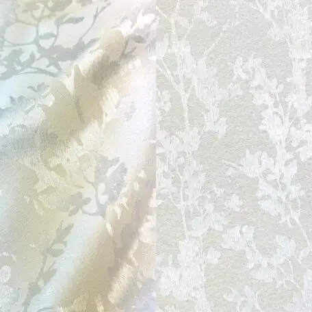Elegant white floral tone-on-tone tablecloth.