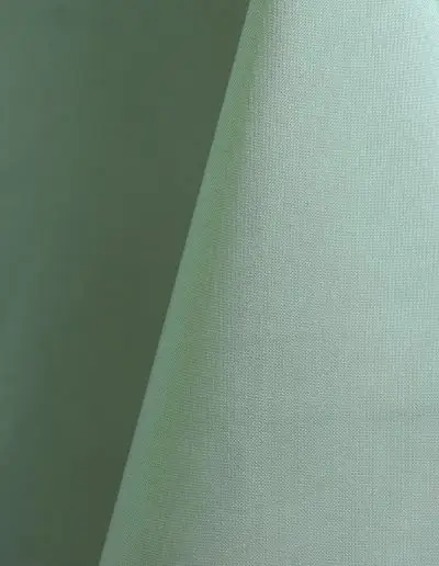 Aqua blue polyester tablecloth, runner, sash, and dinner napkin.