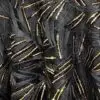 Glitzy black and gold sequin abstract sheer tablecloth.