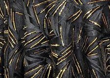 Glitzy black and gold sequin abstract sheer tablecloth.