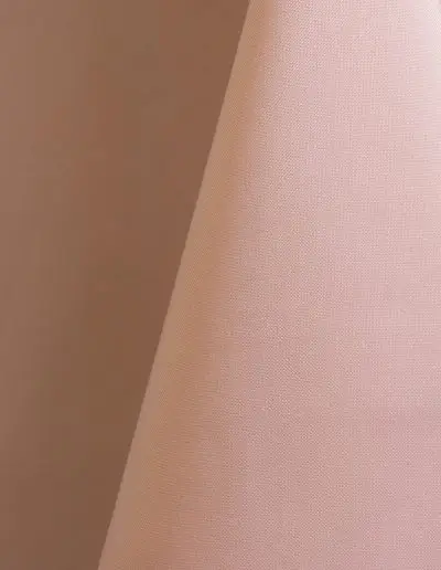 Blush pink polyester tablecloth, runner, sash, and dinner napkin.