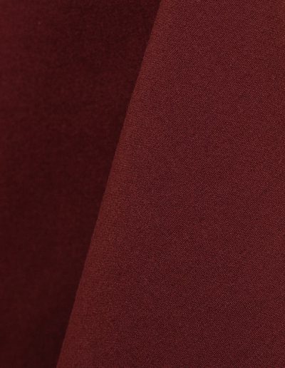 Burgundy cotton tablecloth and dinner napkin.