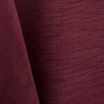 Burgundy majestic dupioni tablecloth, runner, sash, and dinner napkin.