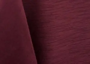 Burgundy majestic dupioni tablecloth, runner, sash, and dinner napkin.