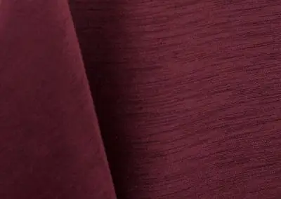 Burgundy majestic dupioni tablecloth, runner, sash, and dinner napkin.