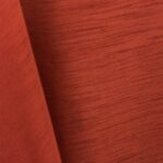 Burnt orange majestic dupioni tablecloth, runner, sash, and dinner napkin.