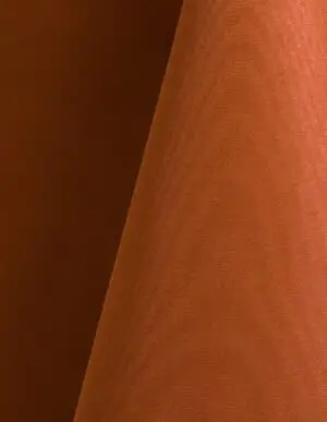 Burnt orange polyester tablecloth, runner, sash, and dinner napkin.