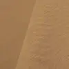 Camel tan cotton tablecloth and dinner napkin.