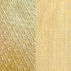 Creamy gold textured dinner napkin.