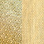 Creamy gold textured dinner napkin.