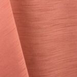 Coral majestic dupioni tablecloth, runner, sash, and dinner napkin.