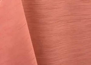 Coral majestic dupioni tablecloth, runner, sash, and dinner napkin.