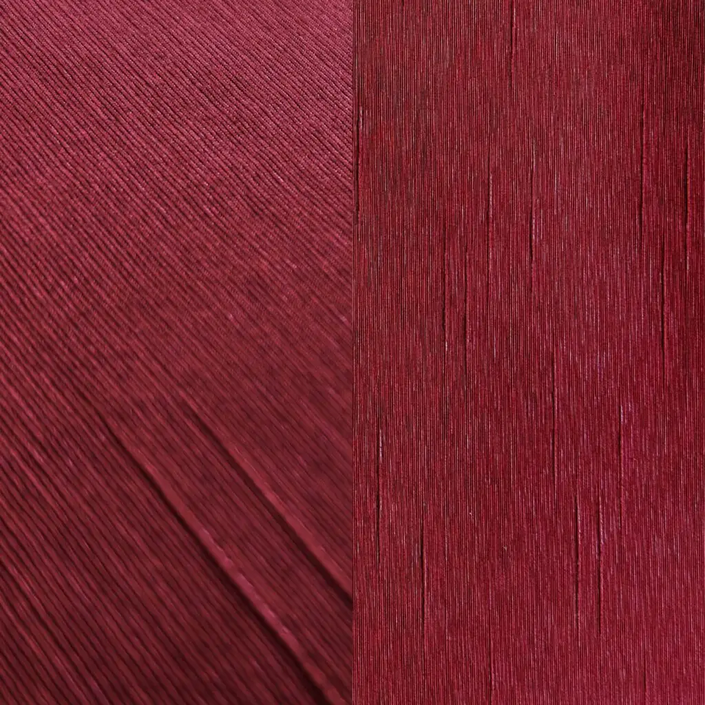 Rich textured deep red tablecloth and runner.