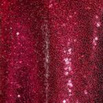 Glitzy dark red sequin tablecloth and runner.