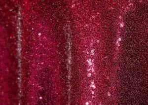 Glitzy dark red sequin tablecloth and runner.