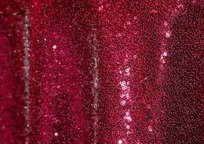 Glitzy dark red sequin tablecloth and runner.