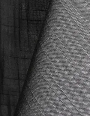 Light grey textured dinner napkin.