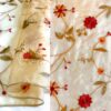 Sheer ivory floral print tablecloth and runner.