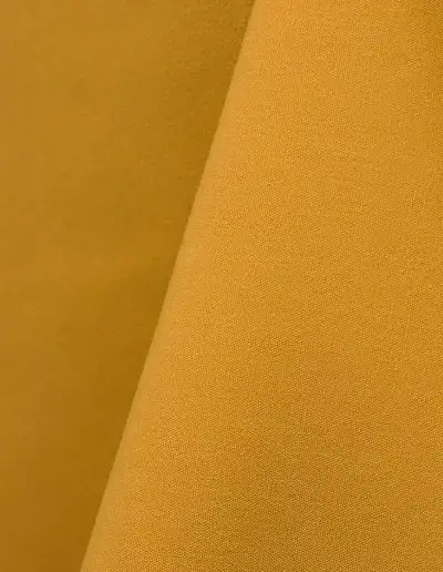 Gold cotton tablecloth and dinner napkin.