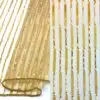 Sheer gold festive tablecloth and runner.
