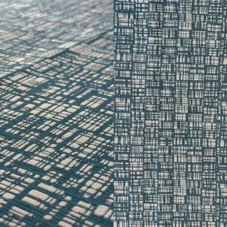 Teal green geometric print tablecloth.