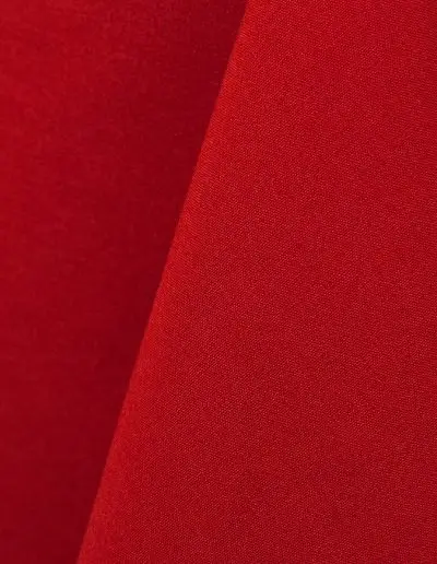 Bright red cotton tablecloth and dinner napkin.