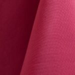 Hot pink polyester tablecloth, runner, sash, and dinner napkin.