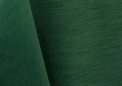 Hunter green majestic dupioni tablecloth, runner, sash, and dinner napkin.