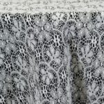 Traditional ivory lace tablecloth and runner.