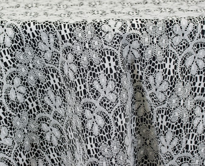 Traditional ivory lace tablecloth and runner.