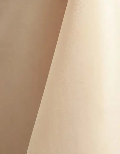 Ivory polyester tablecloth, runner, sash, and dinner napkin.