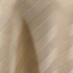 Ivory satin stripe tablecloth.