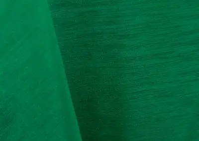 Kelly green majestic dupioni tablecloth, runner, sash, and dinner napkin.