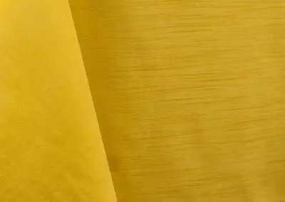 Lemon yellow majestic dupioni tablecloth, runner, sash, and dinner napkin.