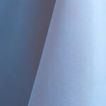 Light blue cotton tablecloth and dinner napkin.