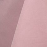 Light pink cotton tablecloth and dinner napkin.