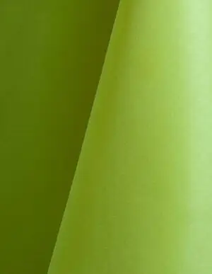 Lime green polyester tablecloth, runner, sash, and dinner napkin.