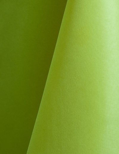 Lime green polyester tablecloth, runner, sash, and dinner napkin.