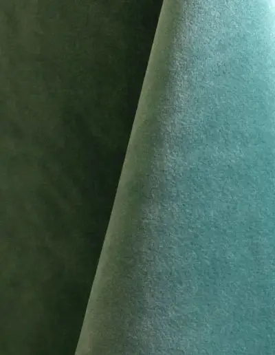 Rich blue green velvet tablecloth and dinner napkin.