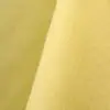 Pale yellow cotton tablecloth and dinner napkin.