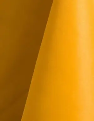 Golden yellow polyester tablecloth, runner, sash, and dinner napkin.