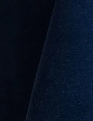 Rich navy blue velvet tablecloth and dinner napkin.