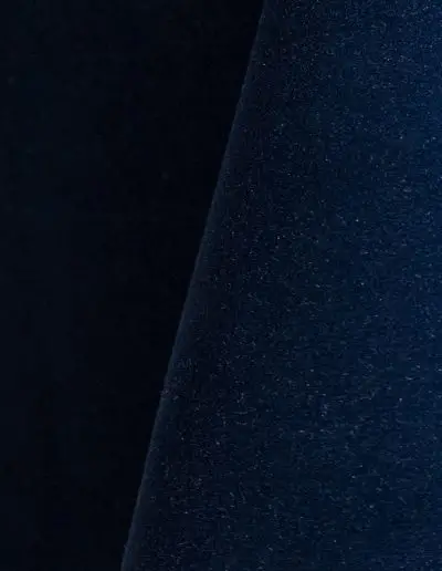 Rich navy blue velvet tablecloth and dinner napkin.