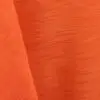 Orange majestic dupioni tablecloth, runner, sash, and dinner napkin.