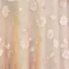 Peach dimensional floral print tablecloth.