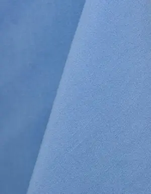 Periwinkle blue cotton tablecloth and dinner napkin.